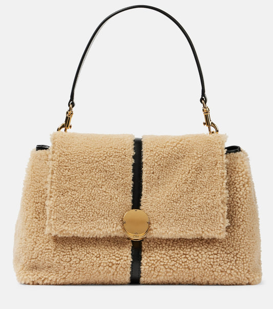 Penelope Medium shearling shoulder bag in beige - Chloe | iBrandZone